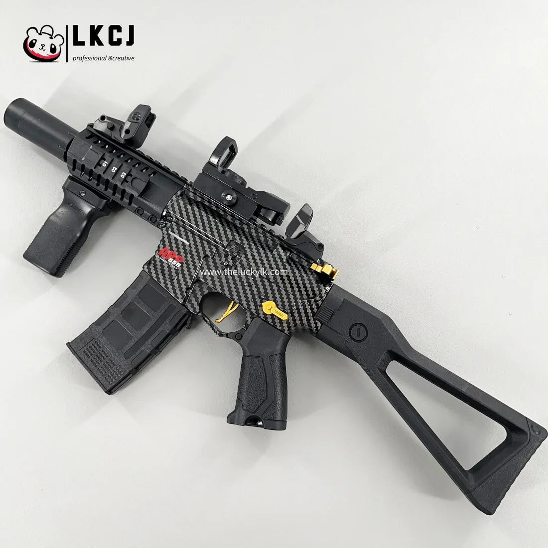 Carbon Fiber Gold Embellished ARP556 Gel Blaster